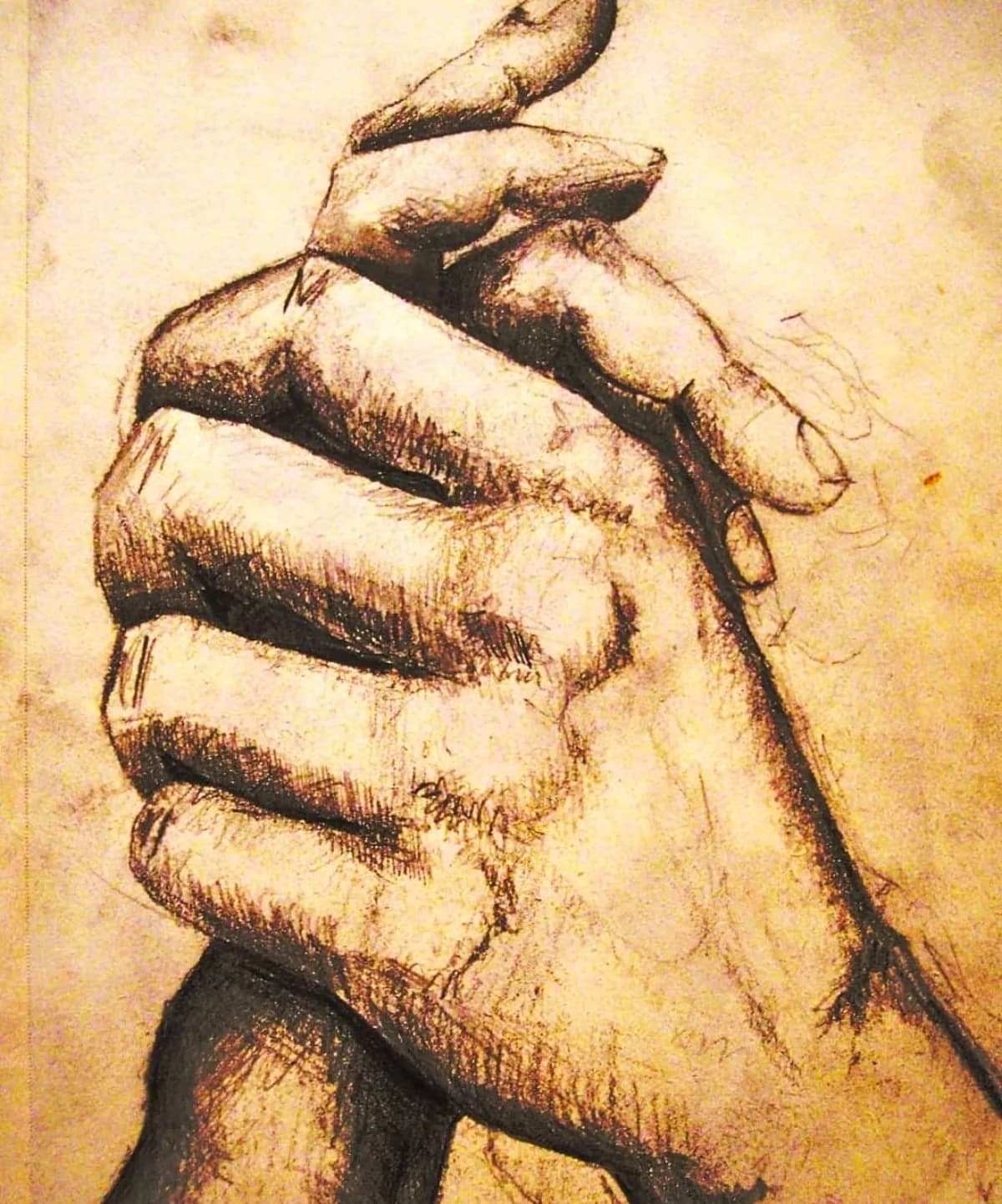 Intensive Kohlezeichnung einer geballten Faust